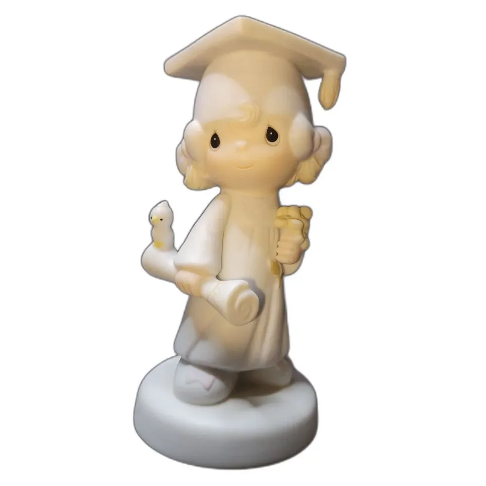 Precious Moments graduation figurine
